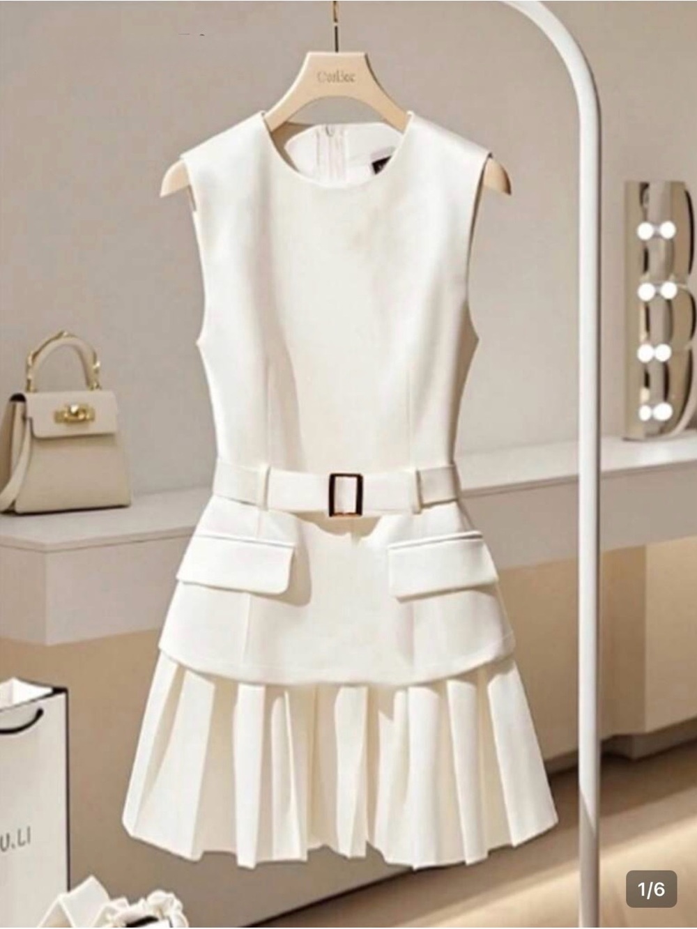 Elegant Sleeveless Cream Belted Pleated Dress